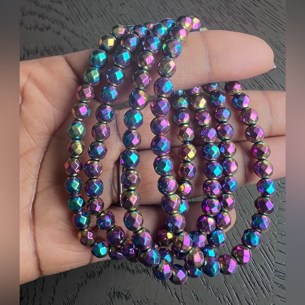 Faceted aura hematite bracelet 7’ (one)